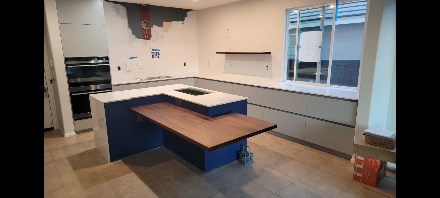Blue and gray modern custom kitchen cabinetry