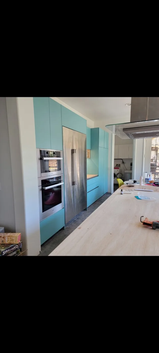 Turquoise contemporary kitchen cabinetry